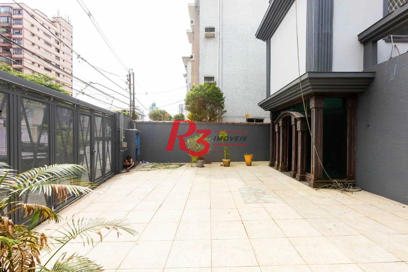 Sobrado com 3 dormitórios à venda, 260 m² por R$ 1.810.000,00 - Ponta da Praia - Santos/SP
