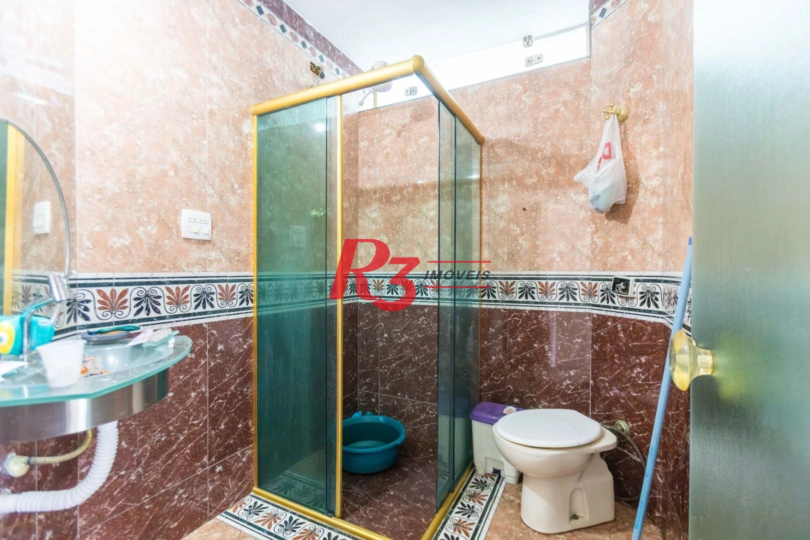 Sobrado com 3 dormitórios à venda, 260 m² por R$ 1.810.000,00 - Ponta da Praia - Santos/SP