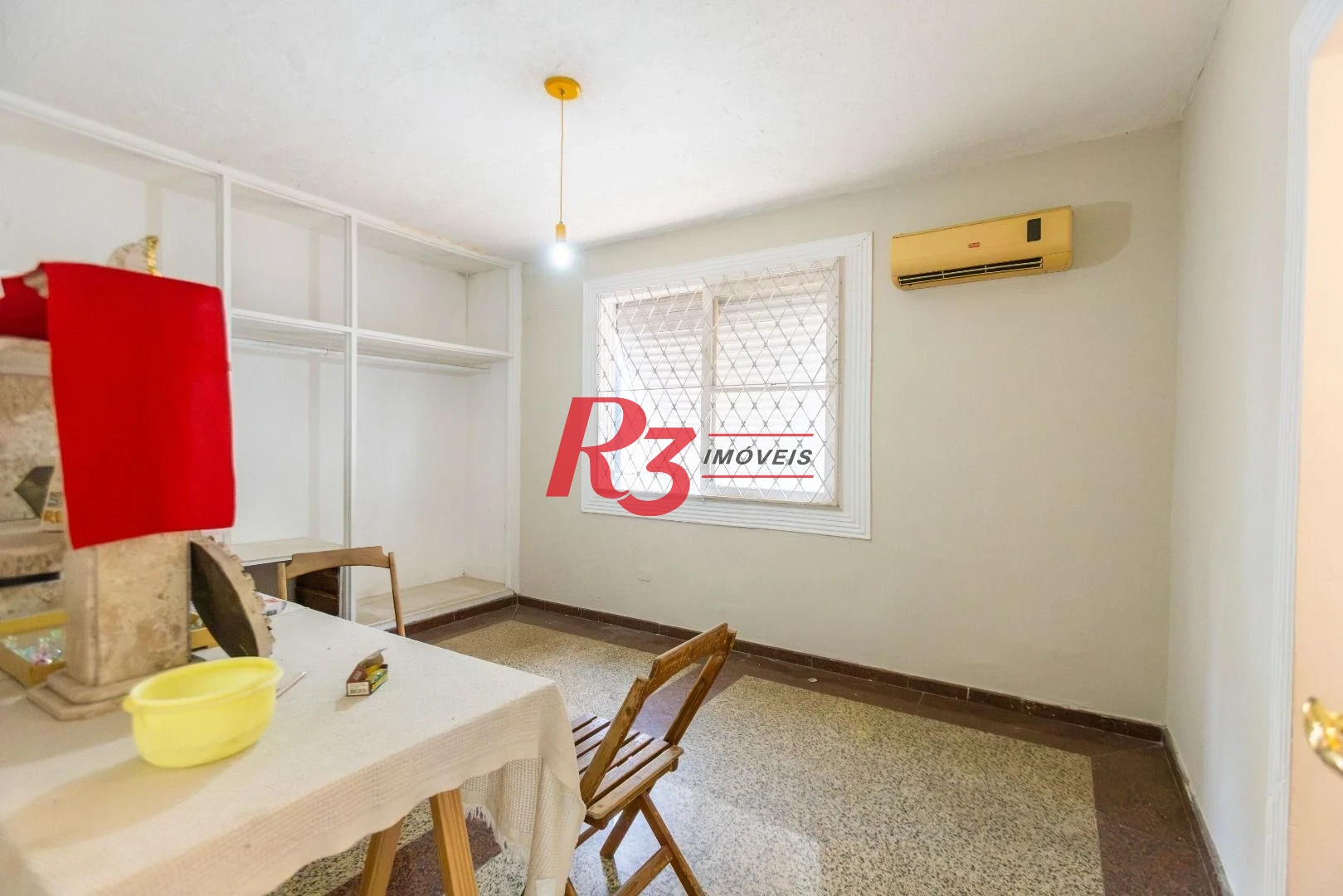 Sobrado com 3 dormitórios à venda, 260 m² por R$ 1.810.000,00 - Ponta da Praia - Santos/SP