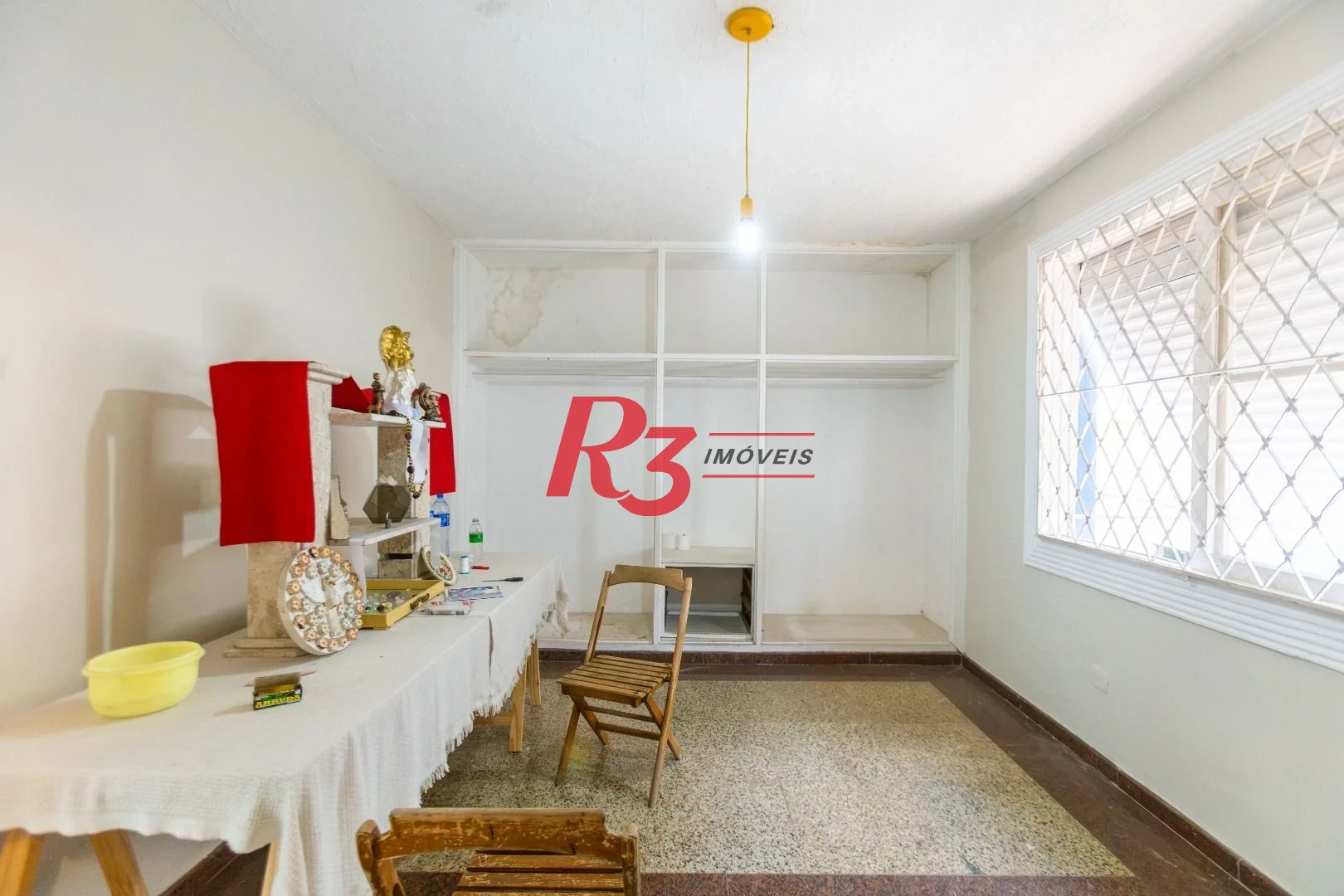 Sobrado com 3 dormitórios à venda, 260 m² por R$ 1.810.000,00 - Ponta da Praia - Santos/SP