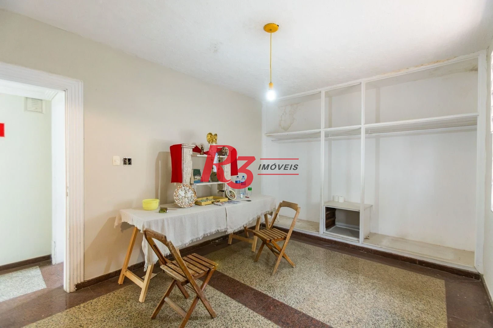 Sobrado com 3 dormitórios à venda, 260 m² por R$ 1.810.000,00 - Ponta da Praia - Santos/SP