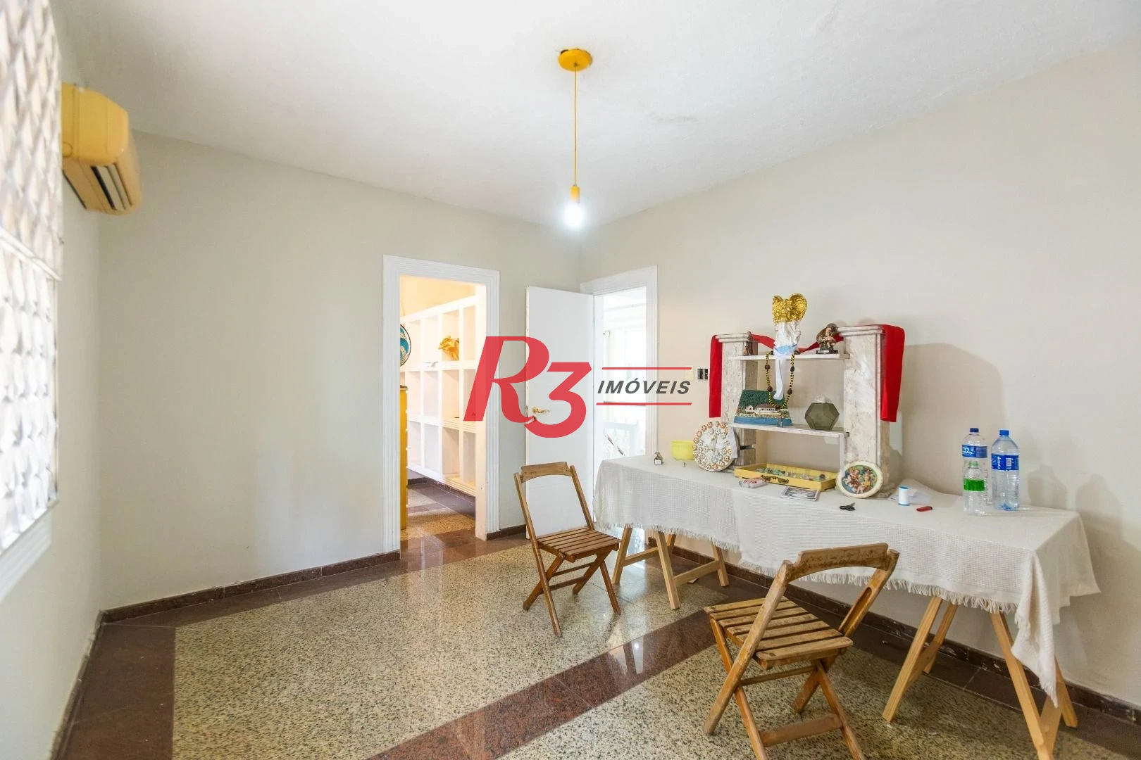 Sobrado com 3 dormitórios à venda, 260 m² por R$ 1.810.000,00 - Ponta da Praia - Santos/SP