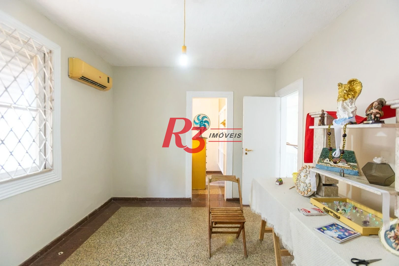 Sobrado com 3 dormitórios à venda, 260 m² por R$ 1.810.000,00 - Ponta da Praia - Santos/SP
