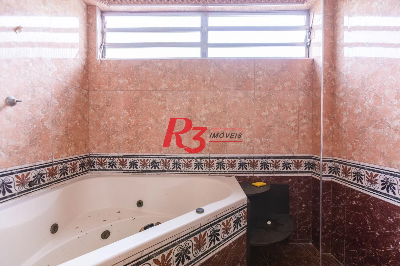 Sobrado com 3 dormitórios à venda, 260 m² por R$ 1.810.000,00 - Ponta da Praia - Santos/SP