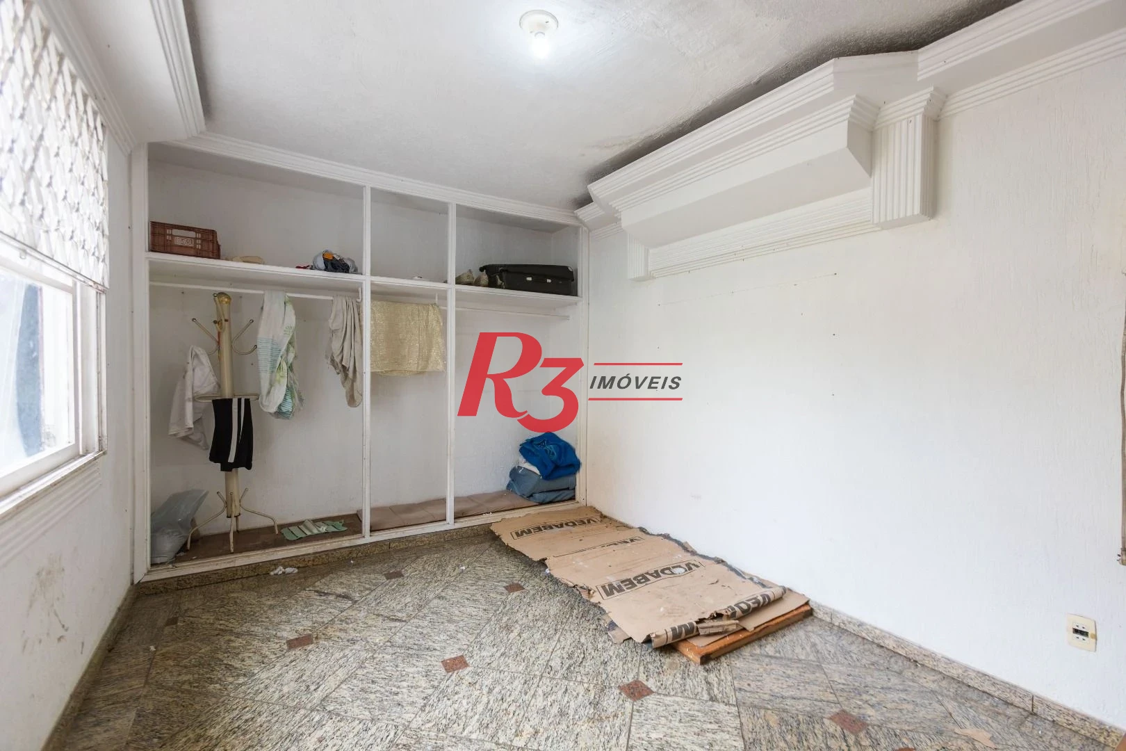 Sobrado com 3 dormitórios à venda, 260 m² por R$ 1.810.000,00 - Ponta da Praia - Santos/SP