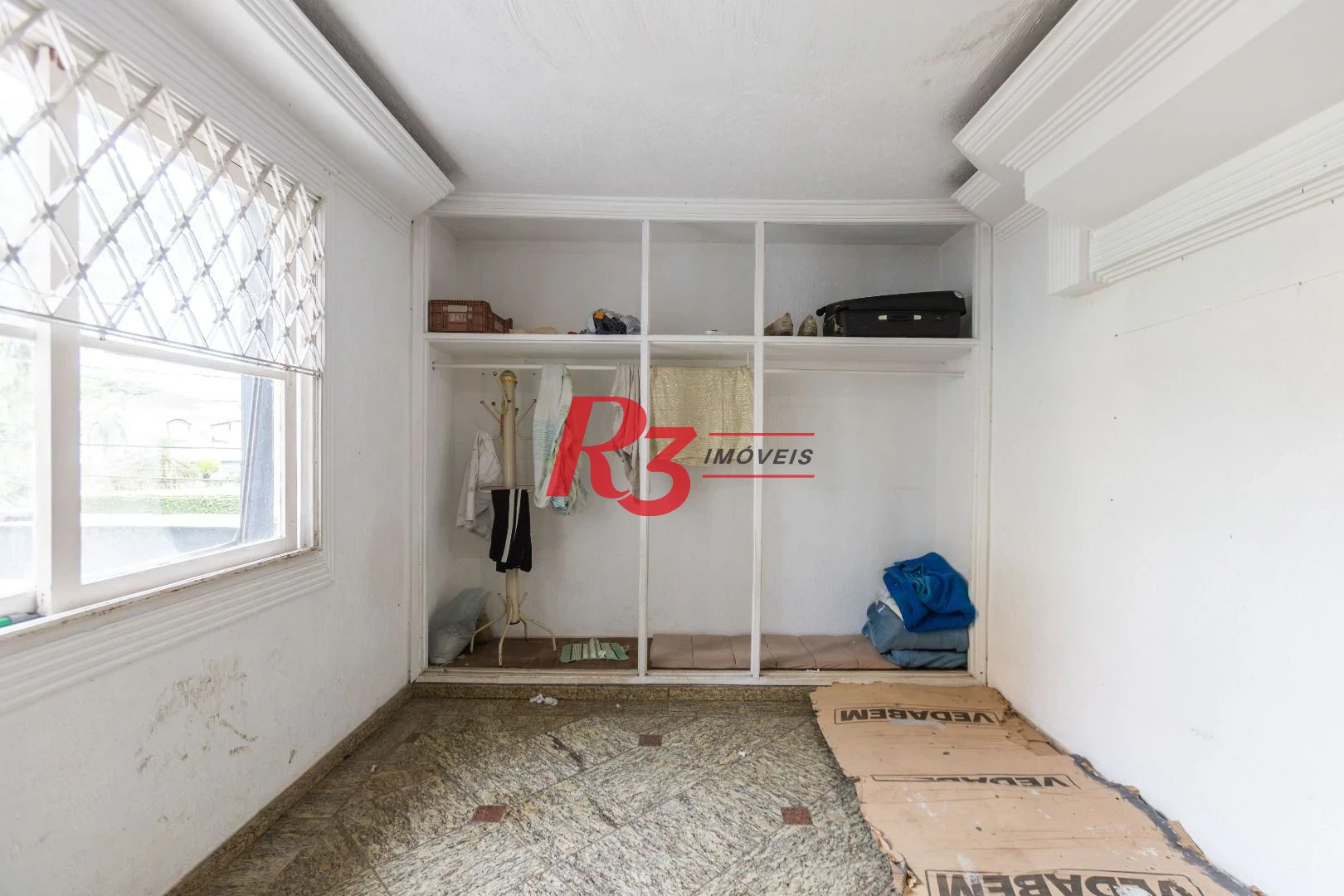 Sobrado com 3 dormitórios à venda, 260 m² por R$ 1.810.000,00 - Ponta da Praia - Santos/SP