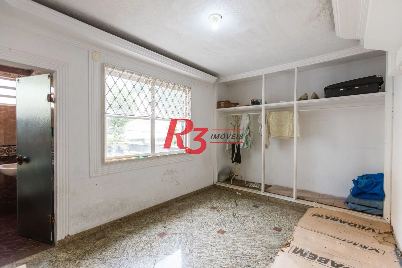 Sobrado com 3 dormitórios à venda, 260 m² por R$ 1.810.000,00 - Ponta da Praia - Santos/SP