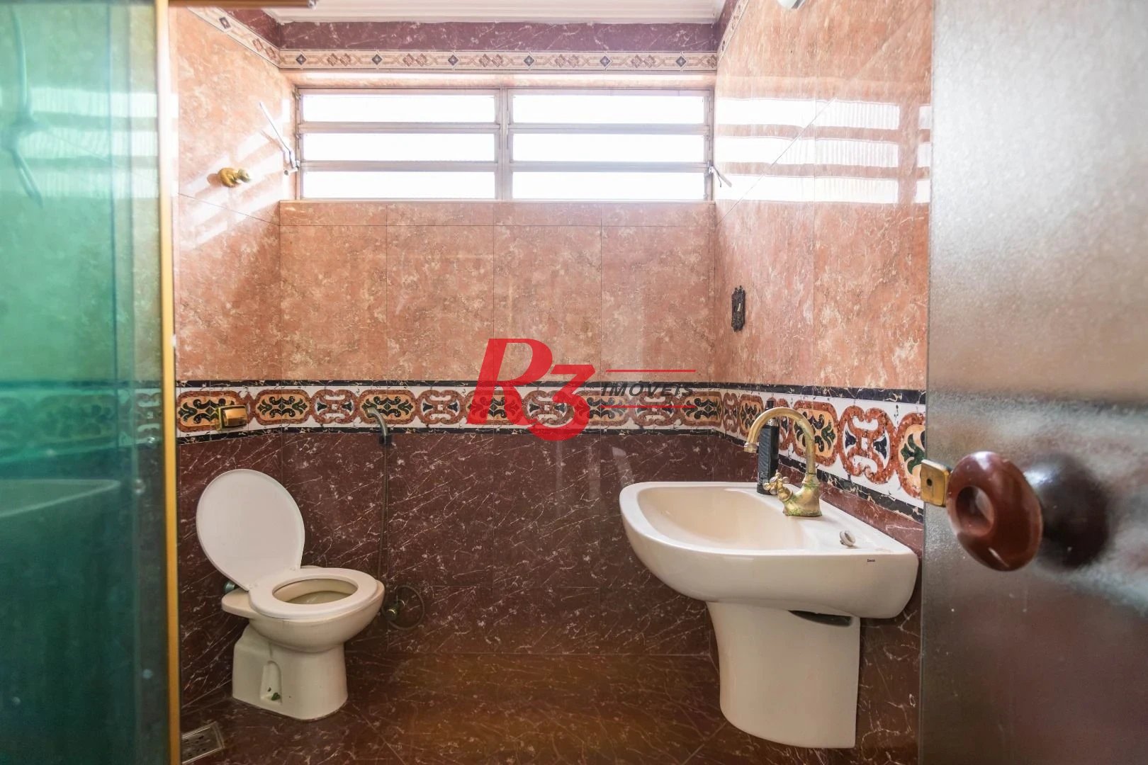 Sobrado com 3 dormitórios à venda, 260 m² por R$ 1.810.000,00 - Ponta da Praia - Santos/SP