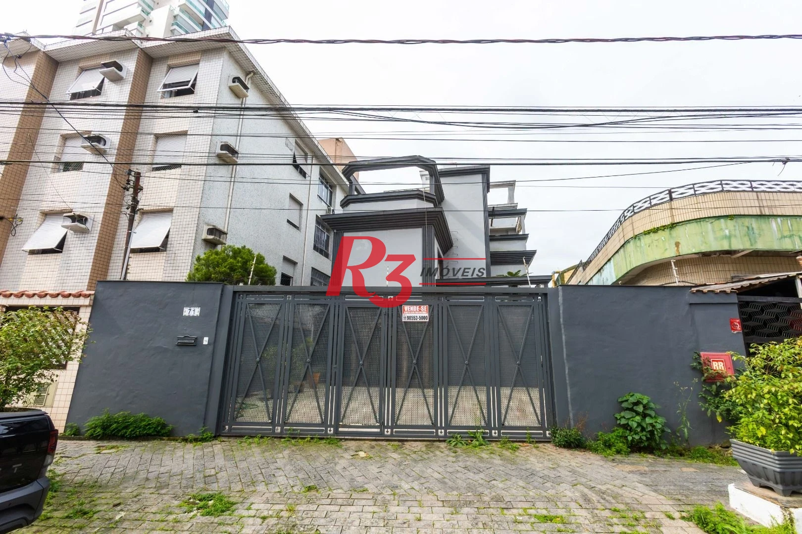 Sobrado com 3 dormitórios à venda, 260 m² por R$ 1.810.000,00 - Ponta da Praia - Santos/SP