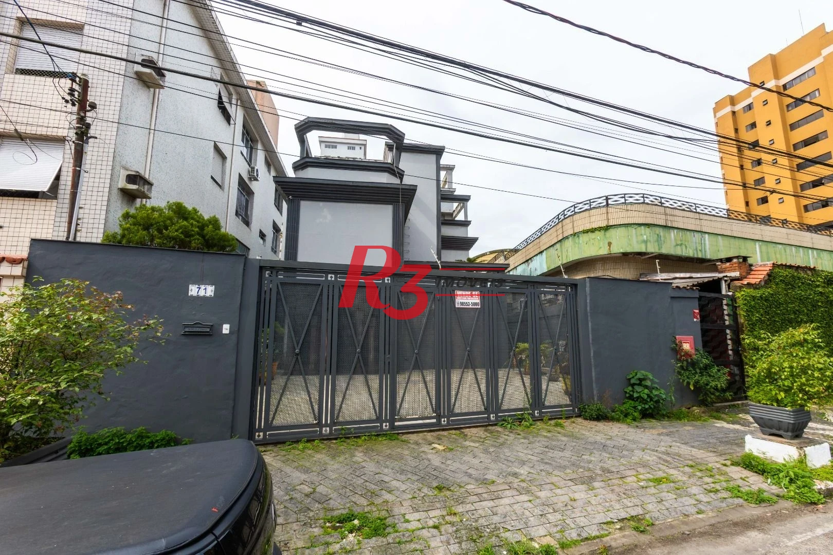 Sobrado com 3 dormitórios à venda, 260 m² por R$ 1.810.000,00 - Ponta da Praia - Santos/SP