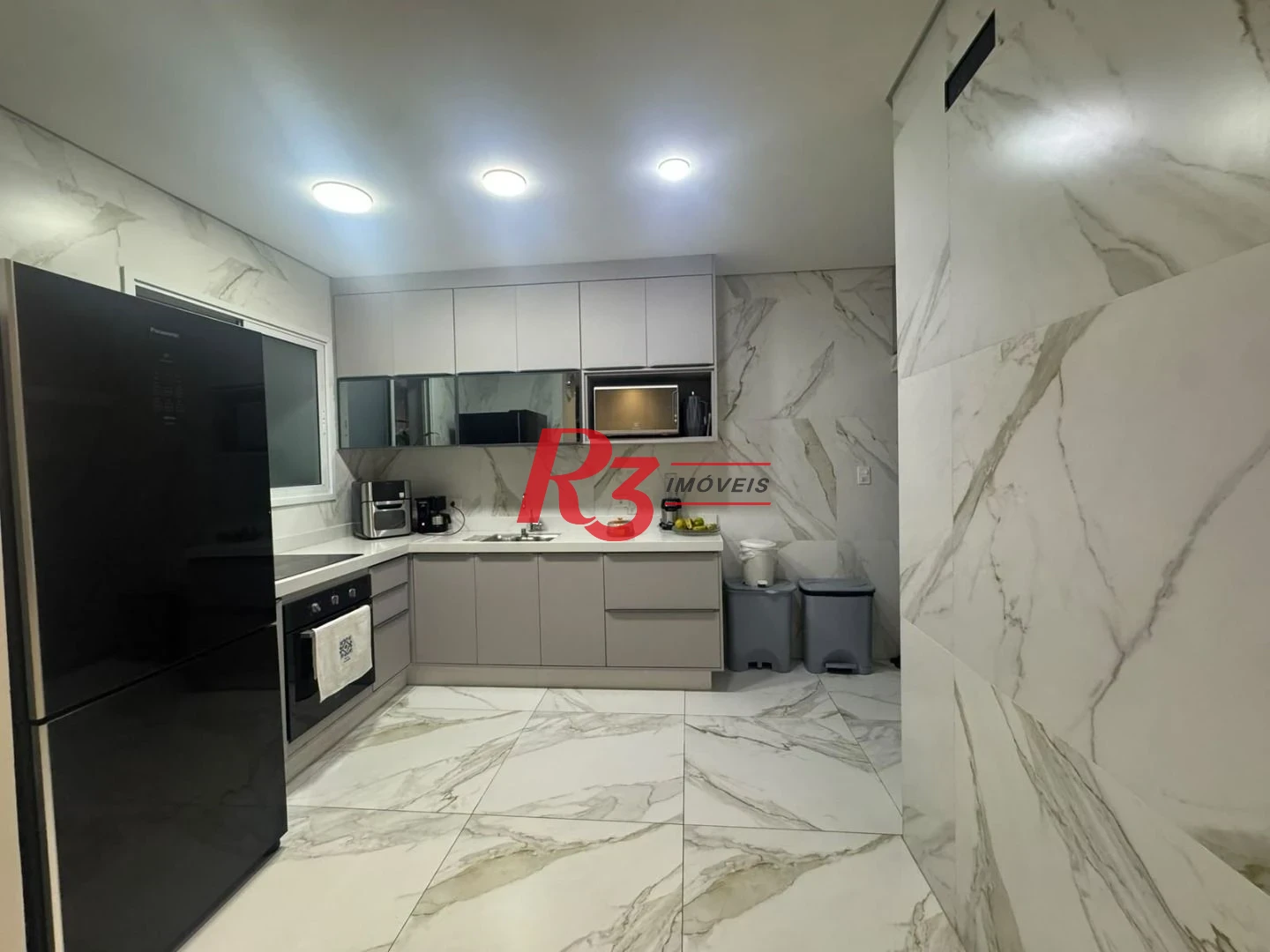 Casa com 3 dormitórios à venda, 190 m² por R$ 2.300.000,00 - Gonzaga - Santos/SP