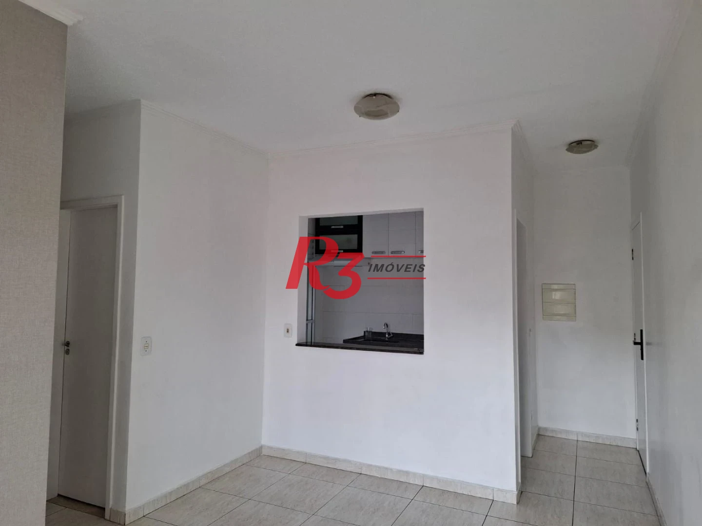 Apartamento com 2 dormitórios à venda, 53 m² por R$ 389.000,00 - Areia Branca - Santos/SP