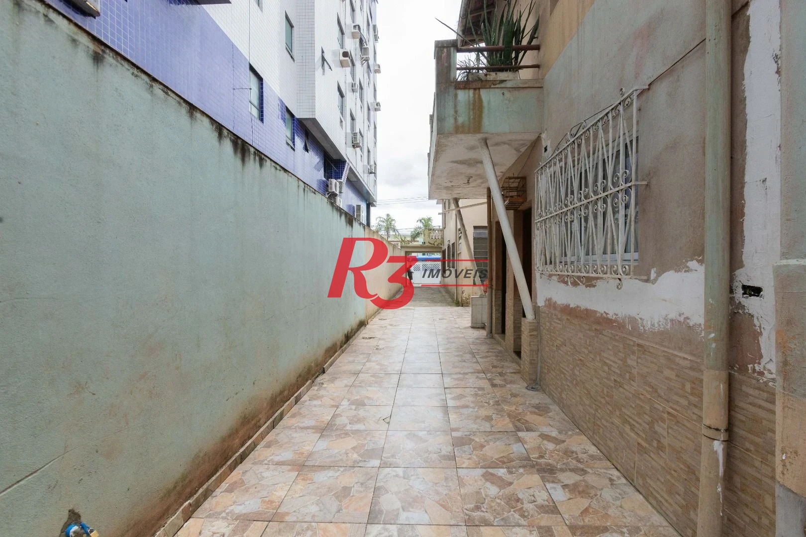 Terreno à venda, 478 m² por R$ 2.200.000,00 - Macuco - Santos/SP