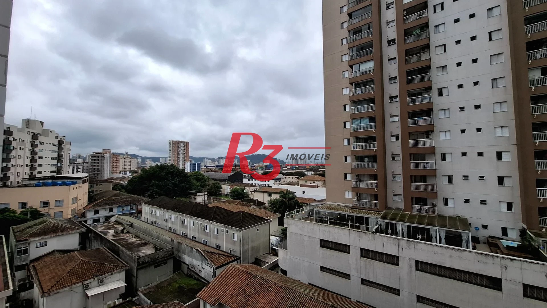 Apartamento com 2 dormitórios à venda, 59 m² por R$ 550.000,00 - Macuco - Santos/SP