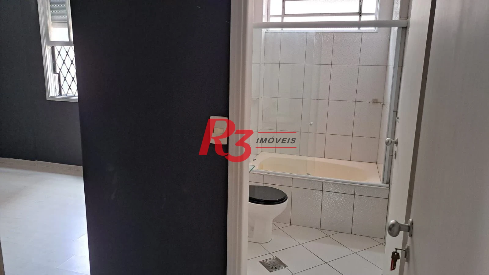 Apartamento com 2 dormitórios à venda, 98 m² por R$ 600.000,00 - Gonzaga - Santos/SP